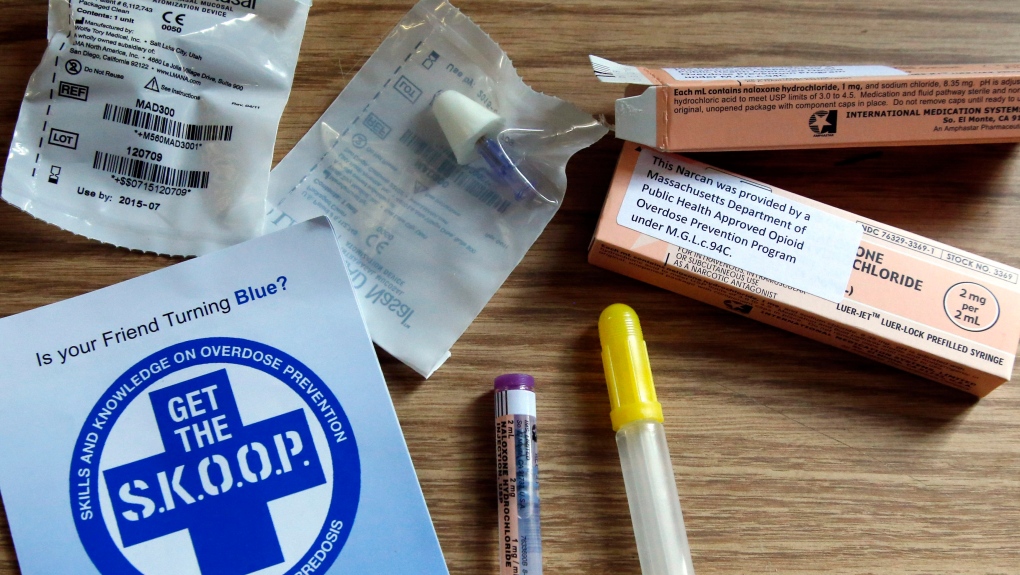 An educational pamphlet and samples of naloxone, a drug used to counter the effects of opiate overdose, are displayed on Monday, Feb. 24, 2014 . (AP / Elise Amendola)