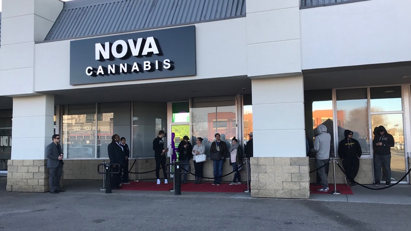 Dozens of customers lined up outside of Nova Cannabis on 80 Ave. and 104 St. in Edmonton before the store opened on Oct. 17, 2018.