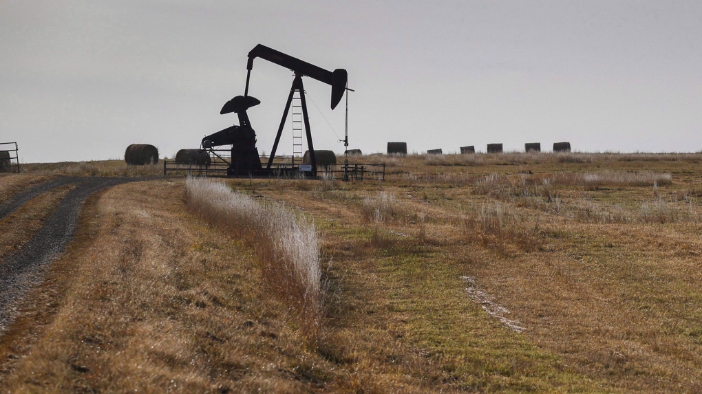 A pumpjack works at a well head on an oil and gas installation near Cremona, Alta., Saturday, Oct. 29, 2016. PrairieSky Royalty Ltd. is reporting a 67 per cent drop in net earnings on sharply lower oil and gas prices in the first quarter. The Calgary-based company earns royalties from oil and gas producers who drill from oil and gas on lands on which it holds the mineral rights. THE CANADIAN PRESS/Jeff McIntosh