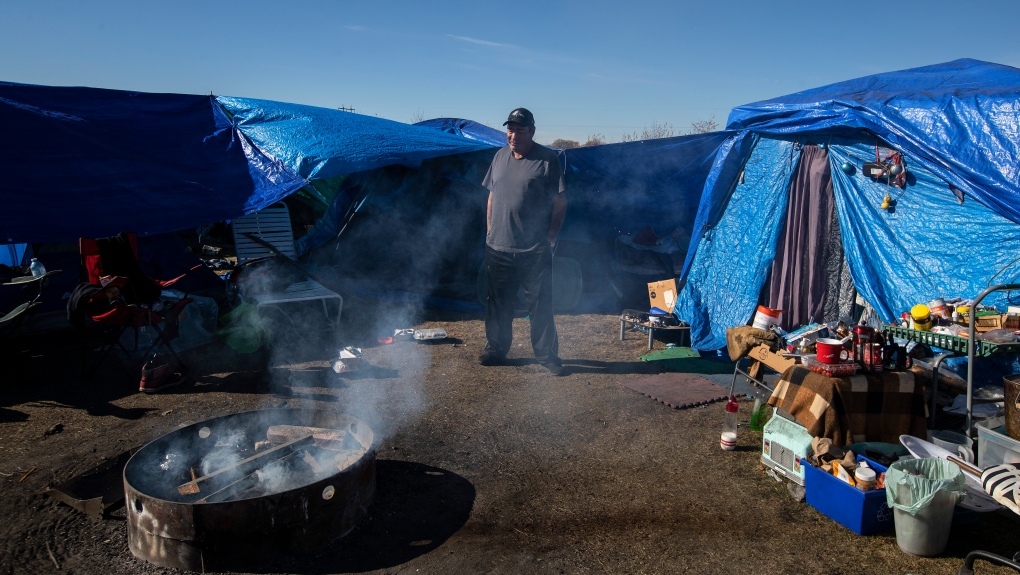 Alvin Johnson is seen at a homeless encampment set up in Wetaskiwin, Alta., on Saturday, Oct. 9, 2021. THE CANADIAN PRESS/Jason Franson 