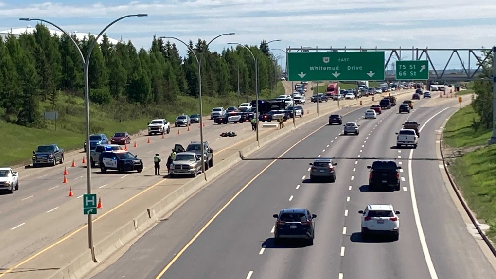 Collision investigators can be seen as Whitemud Drive westbound lanes between 66 Street and 91 Street are reduced to one lane (CTV News Edmonton/Brandon Lynch)