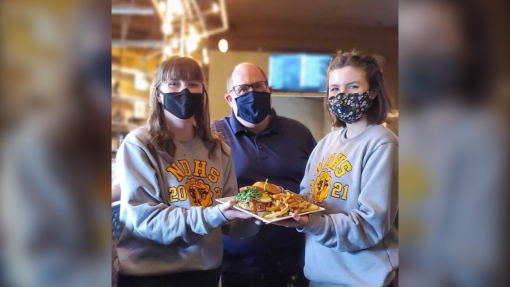 Cilantro and Chive teamed up with Notre Dame High School and raised $874 by donating $2 from every burger sold at the restaurant in the month of May. (Supplied)