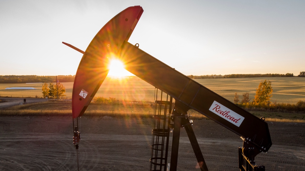 A pumpjack draws out oil and gas from a well head as the sun sets near Calgary, Alta., Sunday, Oct. 9, 2022. Canada has the third largest oil reserves in the world and is the world's fourth largest oil producer. THE CANADIAN PRESS/Jeff McIntosh