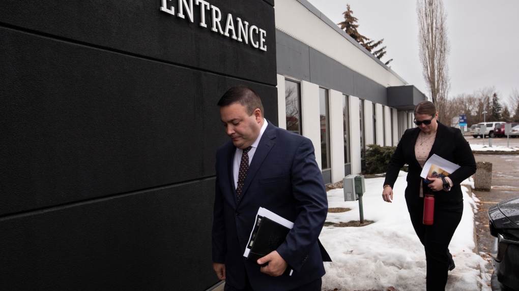 Cpl. Randy Stenger, left, and Const. Jessica Brown, return to court to resume their jury trial on charges of manslaughter with a firearm, aggravated assault and discharging a firearm with intent to cause bodily harm, in Edmonton on Friday, November 25, 2022. Closing arguments in the three-week trial are to begin today. THE CANADIAN PRESS/Amber Bracken