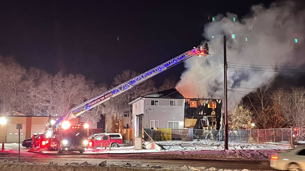 Edmonton Fire Rescue Services respond to a abandoned home fire on Friday, Dec. 9, 2022 (CTV News Edmonton/Sean McClune).