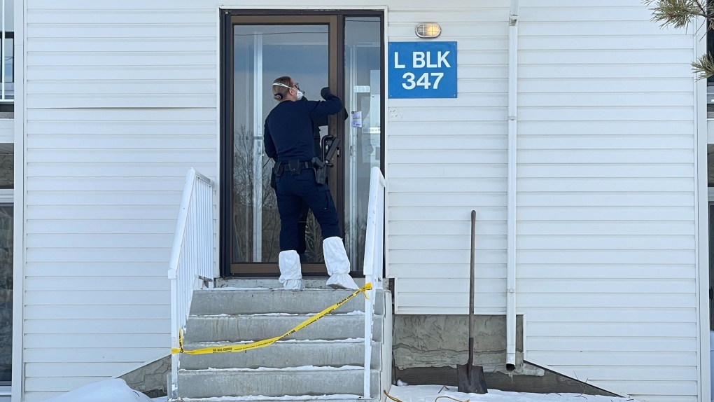 Police investigate on March 26, 2022 near the bus stop where an injured male was found the night before. (CTV News Edmonton/Sean McClune).
