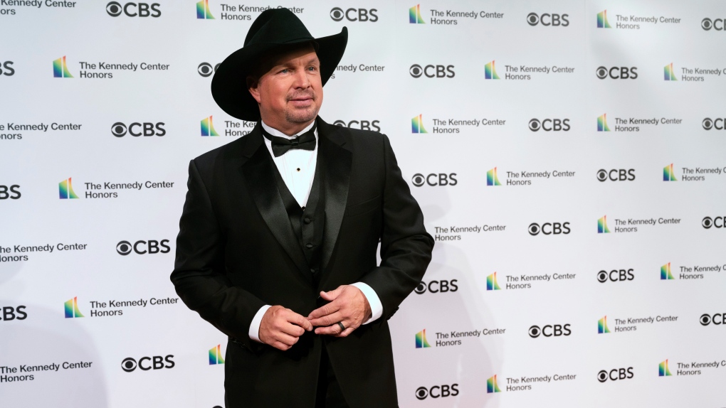 2020 Kennedy Center honoree, country singer-songwriter Garth Brooks attends the 43nd Annual Kennedy Center Honors at The Kennedy Center on Friday, May 21, 2021, in Washington. (AP Photo/Kevin Wolf)