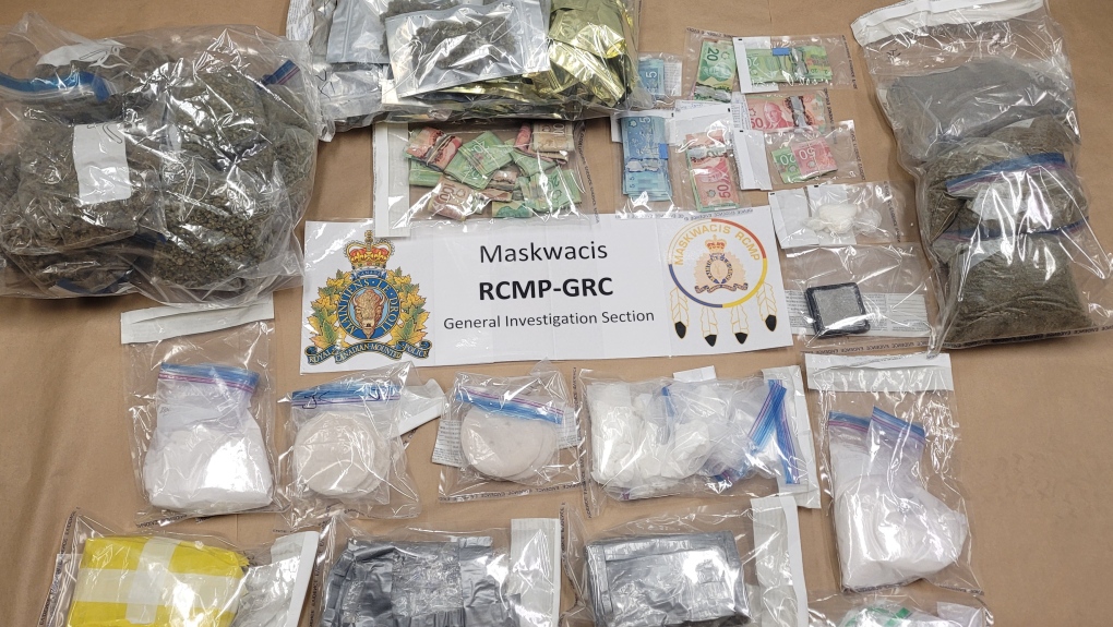 During a May 25, 2022, search of a vehicle and home in Edmonton, RCMP found about 1.6 kilograms of cocaine, about 740 grams of a substance believed to be buffing agent, items used to produce crack cocaine, more than $16,500 in cash, about 13 pounds of illegal cannabis, and 5,400 illegal cigarettes. (Photo provided.) 
