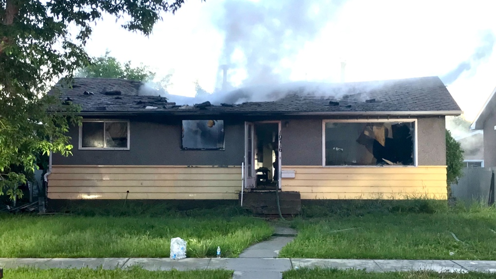 A fire early in the morning of June 22, 2022, caved the roof of a home in Edmonton's Lauderdale neighbourhood. 