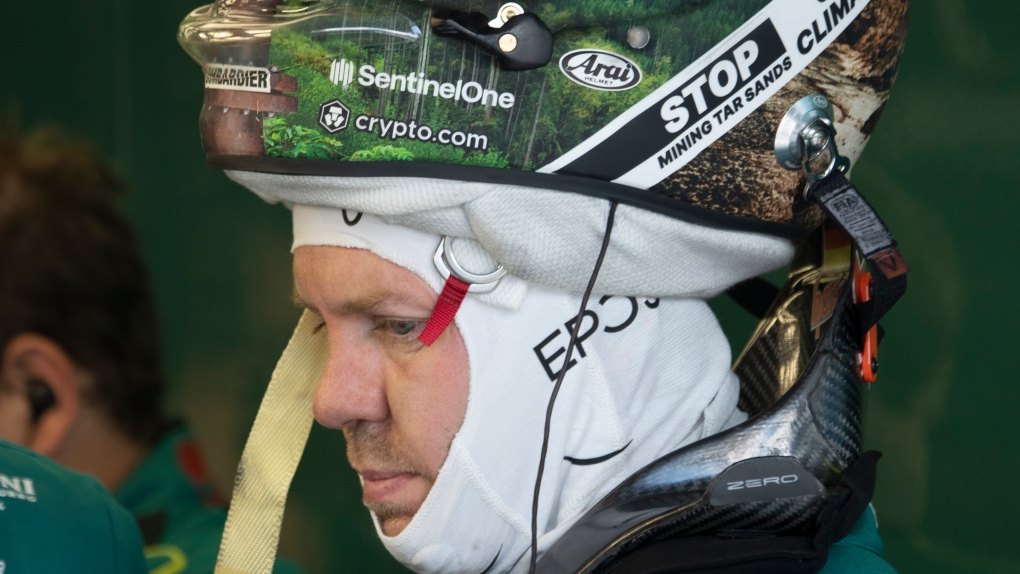 Aston Martin Formula 1 driver Sebastian Vettel, of Germany, wears a patch on his helmet denouncing Canada's oil sands during the first practice session at the Canadian Grand Prix Friday, June 17, 2022 in Montreal.THE CANADIAN PRESS/Ryan Remiorz