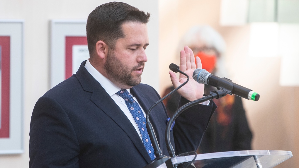 New councillor Michael Janz is sworn in, in Edmonton Alta, on Tuesday October 26, 2021. THE CANADIAN PRESS/Jason Franson
