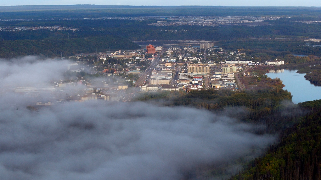 Mist rises from the Clearwater River in an aerial view of Fort McMurray, Alta., Monday, Sept. 19, 2011 (The Canadian Press/Jeff McIntosh).