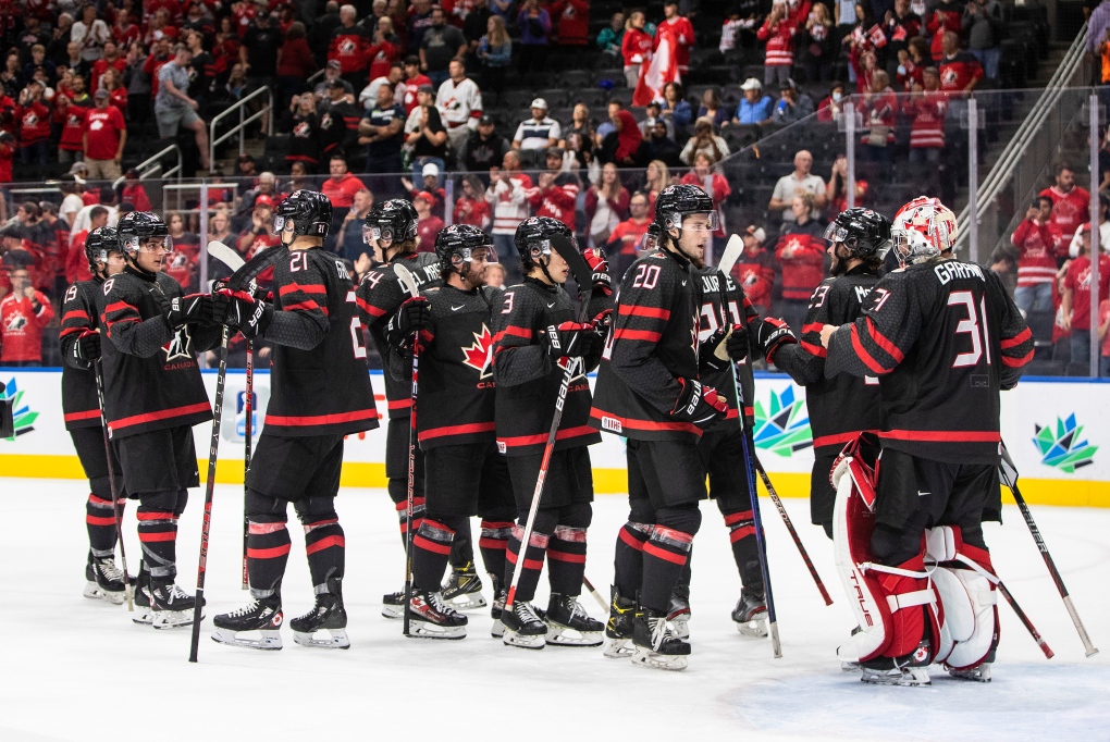 Canada celebrates the win over Switzerland during IIHF World Junior Hockey Championship quarterfinal action in Edmonton on Wednesday August 17, 2022. (THE CANADIAN PRESS/Jason Franson)