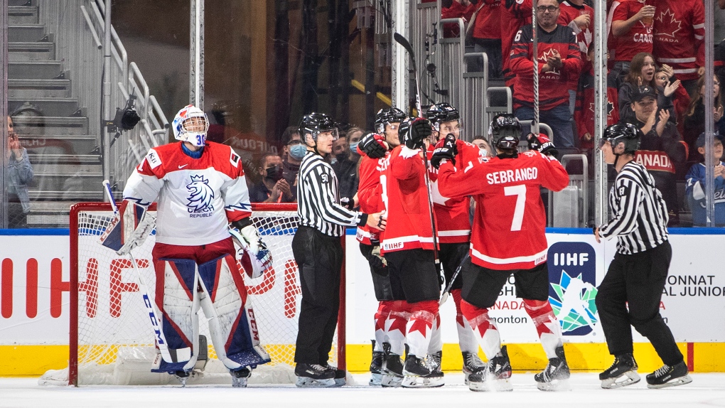 Canada celebrates a goal as Czechia goalie Pavel Cajan (1) looks on during third period IIHF World Junior Hockey Championship semifinal action in Edmonton on Friday August 19, 2022 (The Canadian Press/Jason Franson).