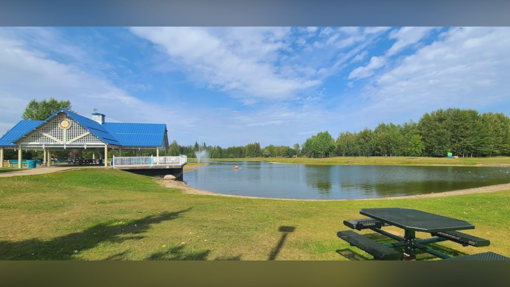 A photo of the pond recreation area at Whitecourt's Rotary Park Outdoor Waterpark (Source: Google Maps/Beth De Jesus/August 2021).
