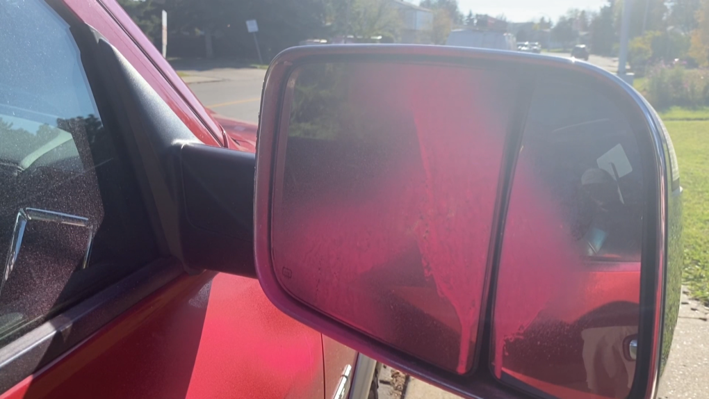 Spray paint can be seen on a vandalized vehicle near Knottwood Road West and 16 Avenue. It's one of at least 15 vehicles spray painted overnight Oct. 1. (Darcy Seaton/CTV News Edmonton)