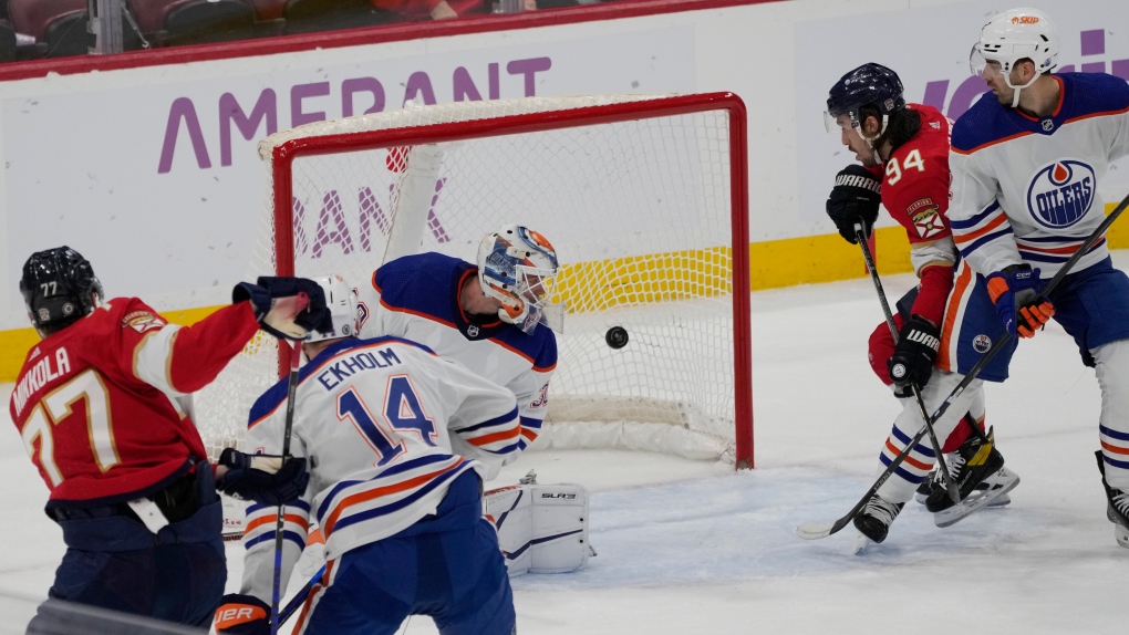 Florida Panthers defenceman Niko Mikkola scores on Edmonton Oilers goalie Calvin Pickard on Nov. 20, 2023, during NHL action in Sunrise, Fla. (Marta Lavandier/Associated Press)