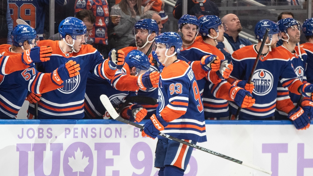 Edmonton Oilers' Ryan Nugent-Hopkins (93) celebrates a goal against the Vegas Golden Knights during shootout NHL action in Edmonton on Tuesday November 28, 2023.THE CANADIAN PRESS/Jason Franson