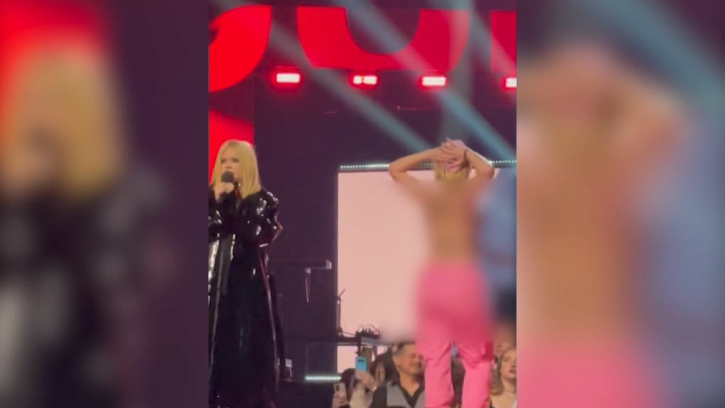 Avril Lavigne Yells at Topless Protester at Juno Awards