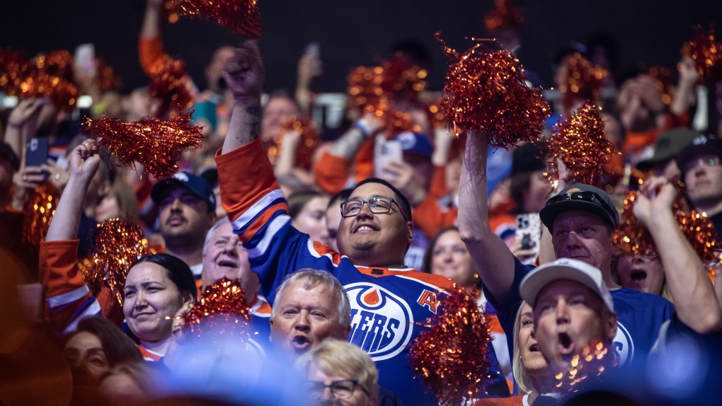Fans cheers as the Vegas Golden Knights and Edmonton Oilers take to the ice for NHL Stanley Cup second round playoff action in Edmonton on Sunday May 14, 2023. (THE CANADIAN PRESS/Jason Franson)