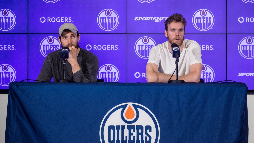Edmonton Oilers' Leon Draisaitl (left) and Connor McDavid speak about the future of the Oilers after the loss to the Vegas Golden Knights in the playoffs, in Edmonton on Tuesday May 16, 2023.THE CANADIAN PRESS/Jason Franson