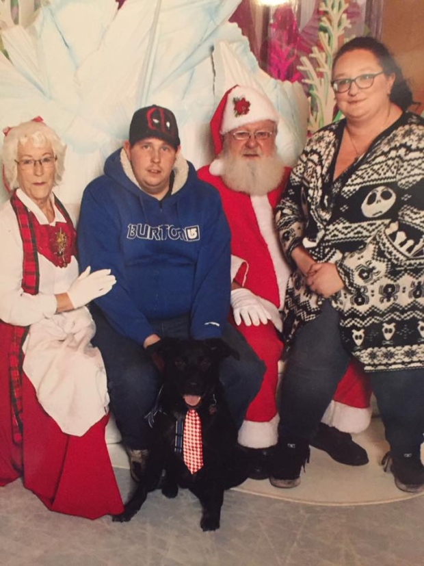 Santa and Mrs. Claus with Granddaughter Nicole